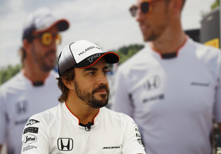 Fernando Alonso in the garage.