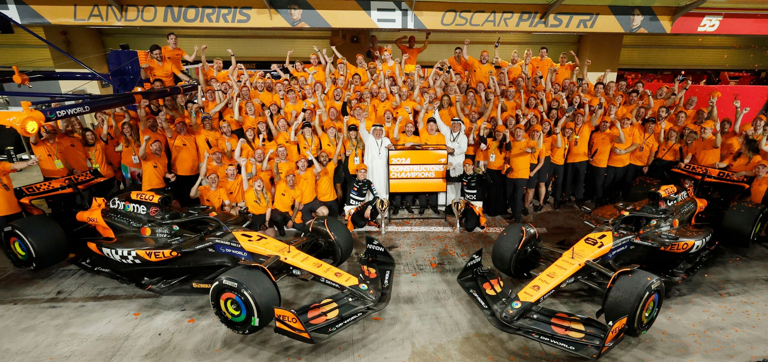 The McLaren team celebrate securing the Constructors Championship title